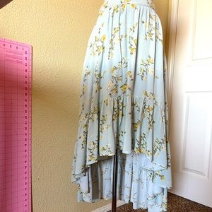 XS High-Low skirt; Mint colored with yellow floral flowers and ruffled hem.